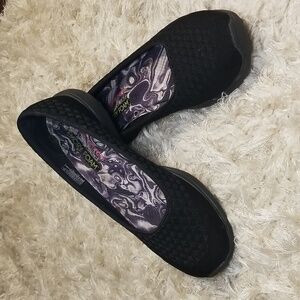 Skechers black slip-on shoes
